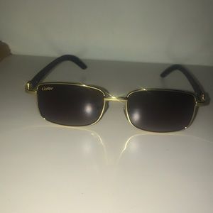 Dark framed Cartier sunglasses